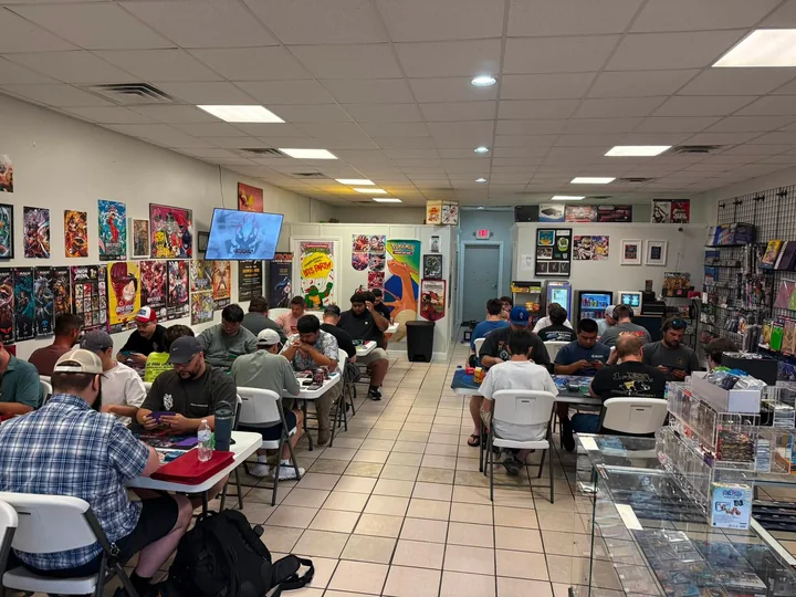 Omni’s community playing trading card games together